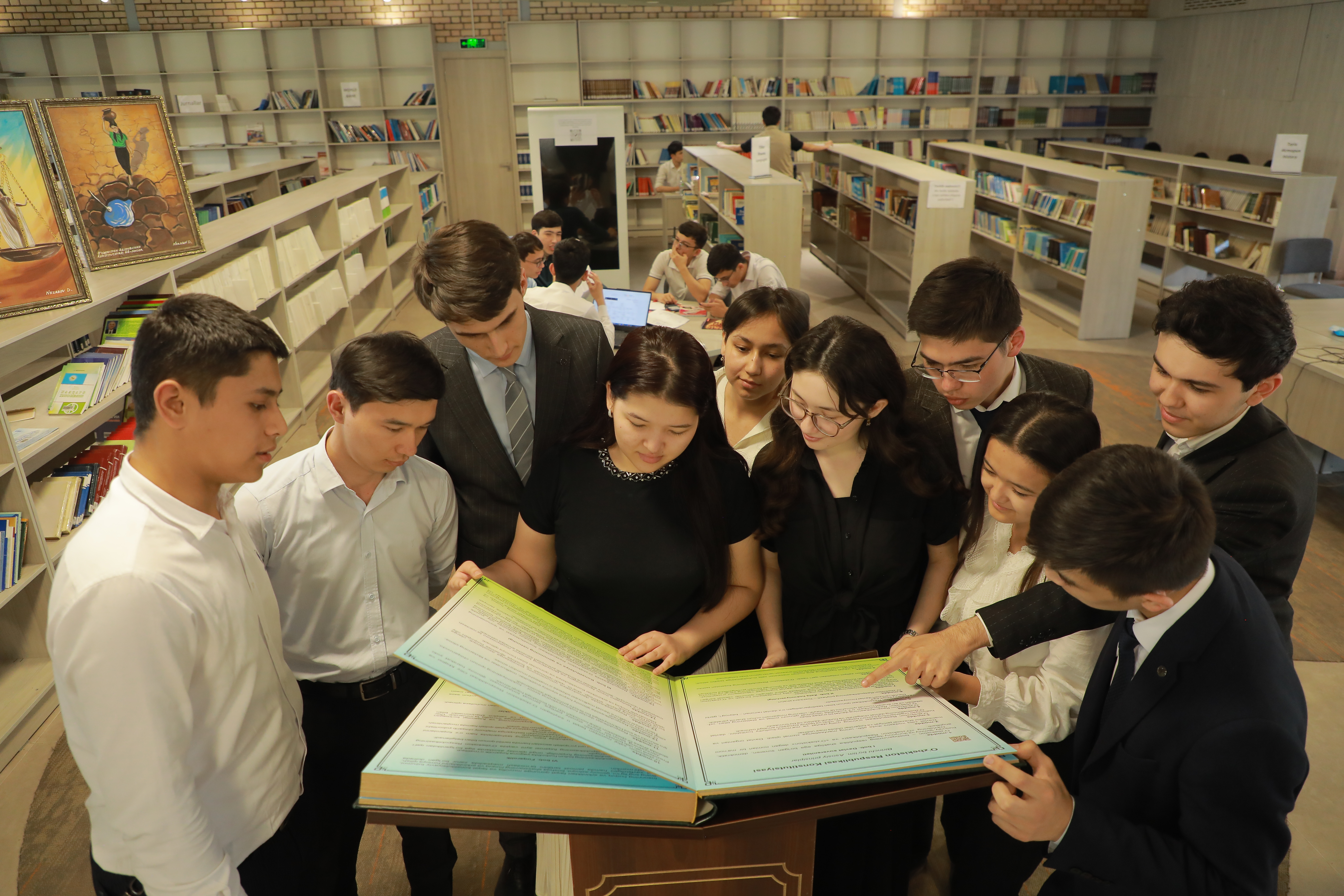 An interactive version of the Constitution of the Republic of Uzbekistan is presented to UWED students